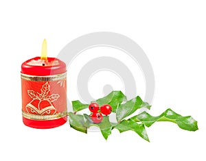 Christmas candle and holly