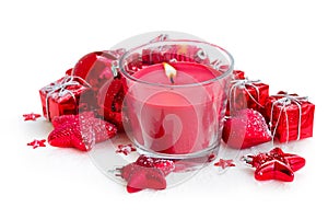 Christmas candle with red decorations