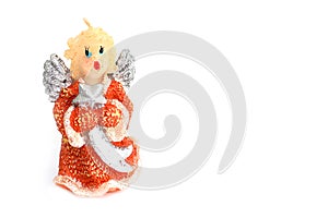Christmas candle in the shape of an angel on a white background