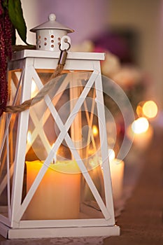 Christmas candle in white lantern