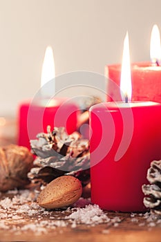 Christmas candles with christmas decorations, christmas or new year atmosphere