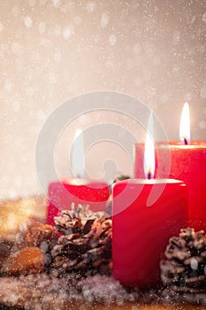 Christmas candles with christmas decorations, christmas or new year atmosphere