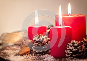 Christmas candles with christmas decorations, christmas or new year atmosphere