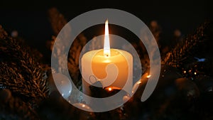 Christmas candles on fir tree lights background.