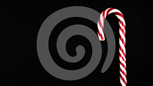 Christmas candy cane on black background. isolate. Flat lay, top view, copy space