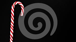 Christmas candy cane on black background. isolate. Flat lay, top view, copy space