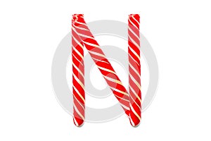 Christmas Candy Cane in the form of letter N. Letter N made of Red Candy Cane Isolated on White Background