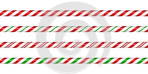 Christmas candy cane straight line border with red and green striped. Xmas seamless line with striped candy lollipop
