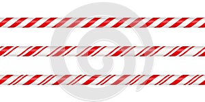 Christmas candy cane straight line border with red and white striped. Xmas seamless line with striped candy lollipop