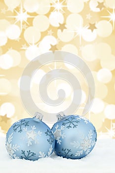 Christmas card balls baubles gold golden background stars snow