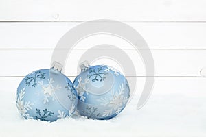 Christmas card balls baubles wood wooden background snow