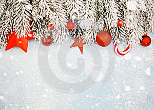 Christmas card border. Winter background with snow and Xmas decorations