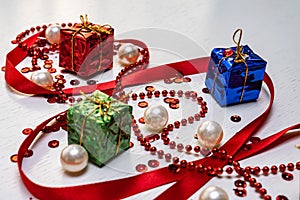 Christmas card. Bright Christmas decorations on a white wooden background