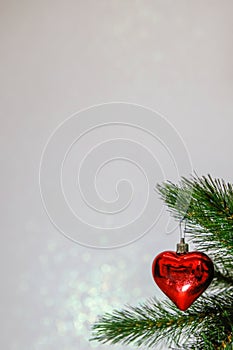 Christmas card, Christmas tree branch with a toy