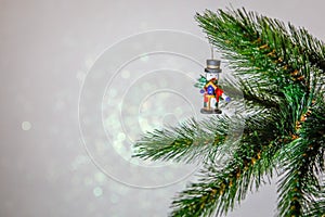 Christmas card, Christmas tree branch with a toy