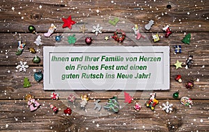 Christmas card with colorful decoration and german text merry ch