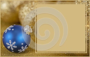 Christmas card decorated with blue and gold ornaments