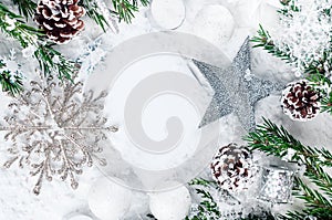 Christmas card with decorated fir tree on snow.