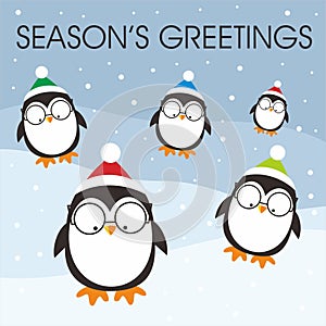 Christmas card design with cute penguins