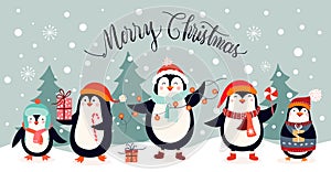 Christmas card design with cute penguins on an winter landscape
