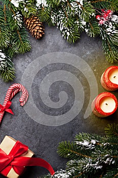 Christmas card with gift box and fir tree