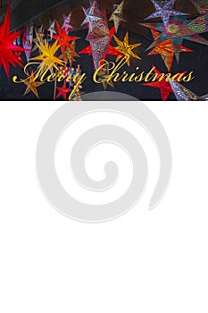 Christmas card with a header showing colorful stars and \