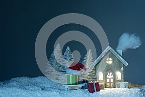 Christmas card with house and gifts