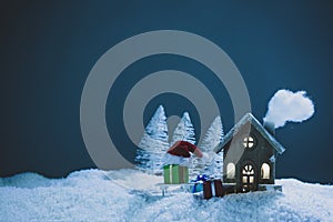 Christmas card with house and gifts