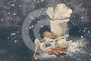 Christmas card with the inscription Merry Christmas. White cup on Santa sleigh on a dark background
