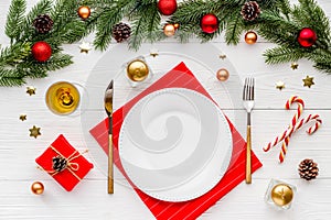 Christmas card or menu template copy space. Holiday table setting flat lay