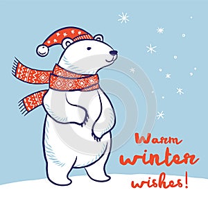 Christmas card of polar bear in red scarf and hat