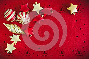 Christmas Card Red background with golden decorations, Balls and Stars, and place for text