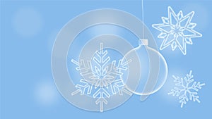 Christmas card showing snowflakes and a Christmas tree bauble