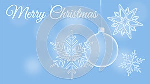 Christmas card showing snowflakes and a Christmas tree bauble