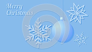 Christmas card showing snowflakes and a Christmas tree bauble