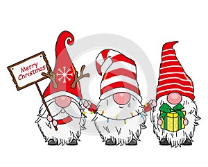 Christmas card. Three cute gnomes. photo