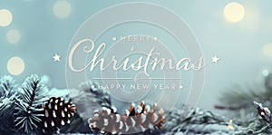 Christmas card with tree branches and pine cones. Merry Xmas background with lights on blue snowy surface. Happy New Year.