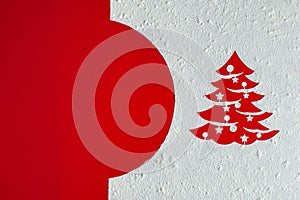 Christmas card with xmas tree drawing in flour on red background