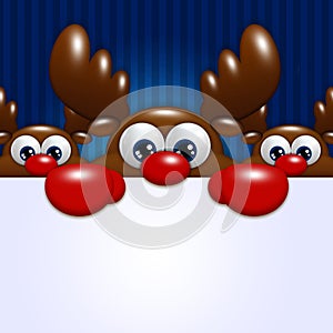 Christmas cartoon reindeers over blue background holding blank