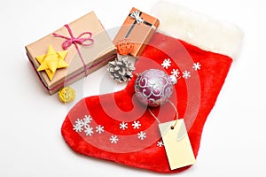 Christmas celebration. Contents of christmas stocking. Small items stocking stuffers or fillers little christmas gifts