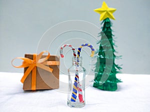 Christmas Celebration with Sweet , gifts,  candy Under a Christmas tree in a blurred background