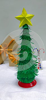 Christmas Celebration with Sweet , gifts,  candy Under a Christmas tree in a blurred background