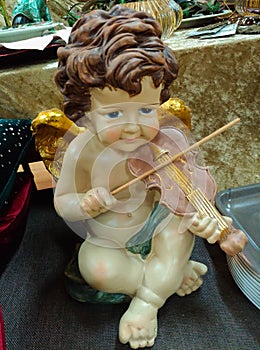 Christmas ceramic angel playing violin