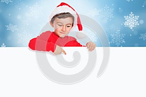Christmas child kid boy Santa Claus pointing finger empty banner sign copyspace