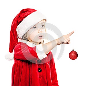 Christmas Child in Santa Hat with New Year`s Glass Ball Isolated