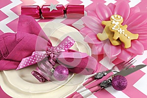 Christmas children family party table place settings in pink and white theme
