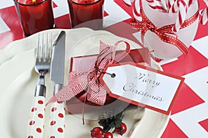 Christmas children family party table place settings in red and white theme