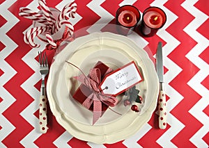 Christmas children family party table place settings in red and white theme