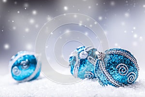 Christmas. Christmas blue balls snow and space abstract background