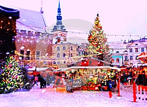 Christmas in the city  holiday new year in Tallinn old town square Christmas tree decoration light market place Estonia